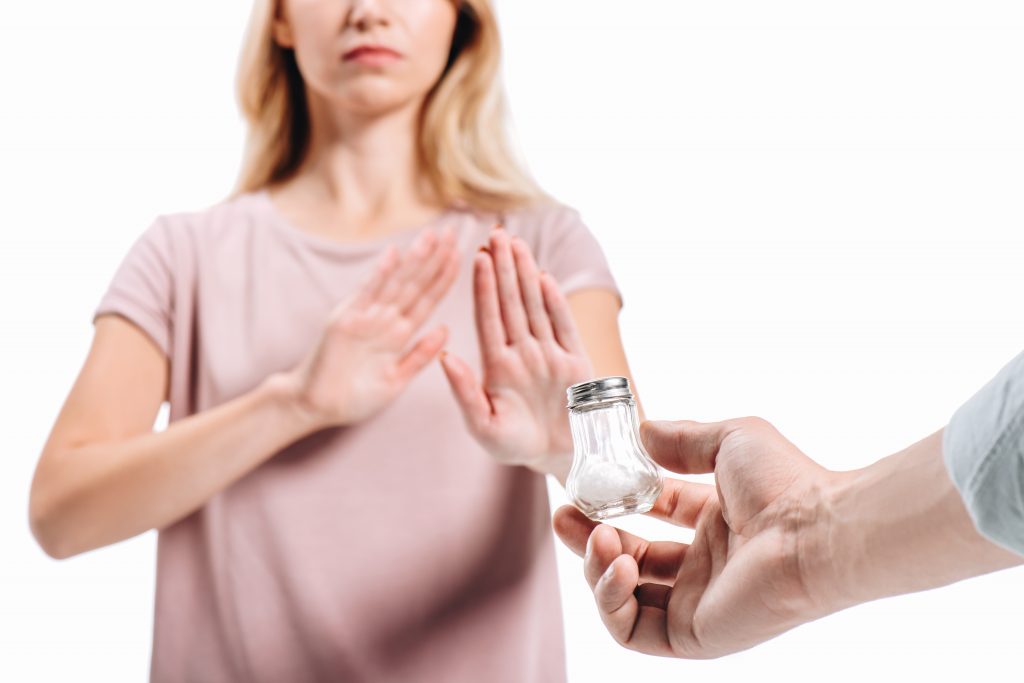 woman saying no to salt